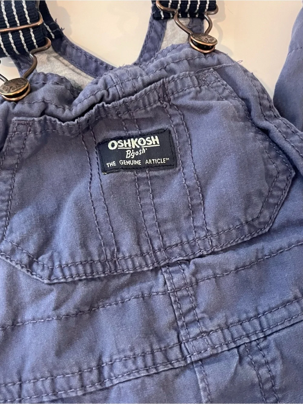 OshKosh B'gosh blue overalls with striped straps 18m